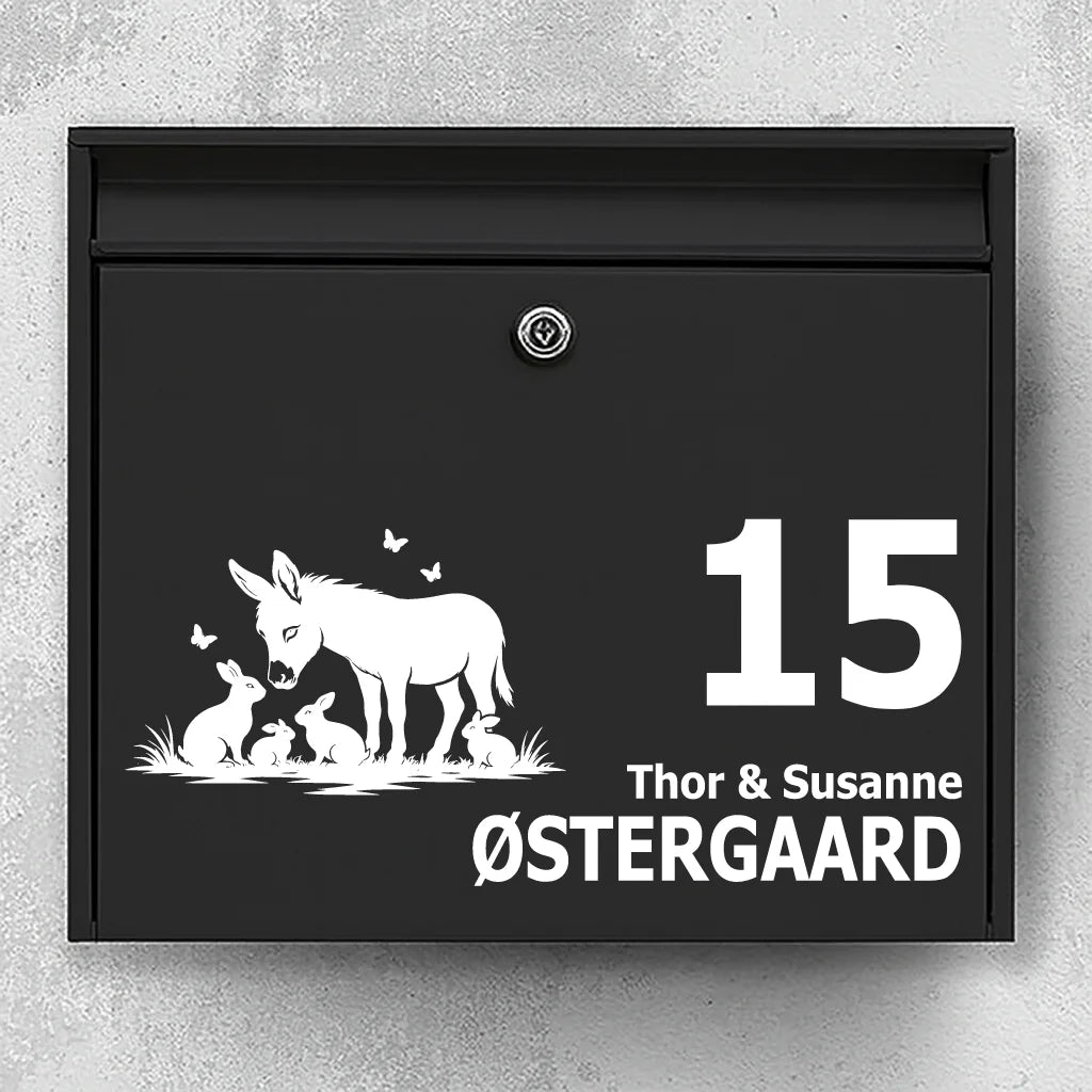 Brievenbussticker met Ezel met konijnen